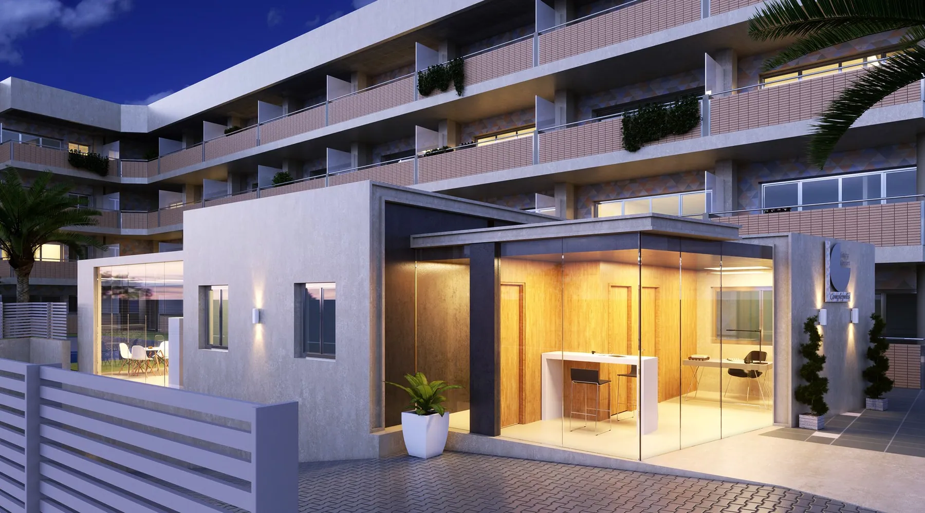 Render de acceso iluminado a una promoción residencial